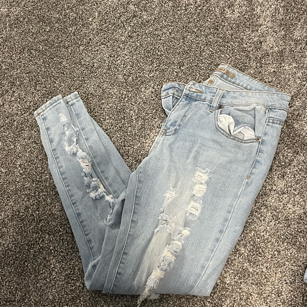 Light blue ripped skinny jeans